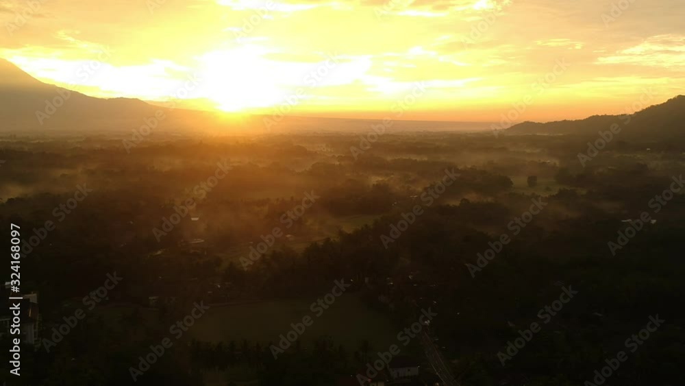golden skies above Indonesian rice fields golden skies above Indonesian rice fields
