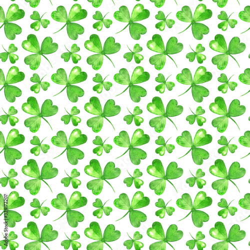 Seamless pattern with shamrock. Hand painted watercolor green leaves on white background