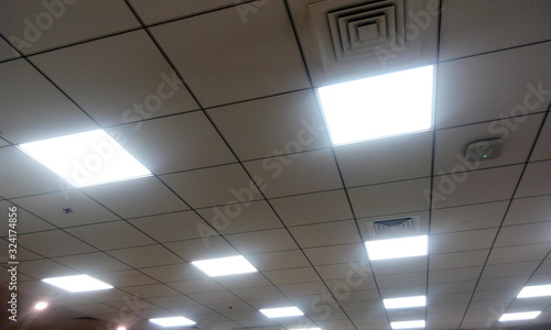 Grid ceiling for an office workstation area by calcium silicate materials for an office building photo