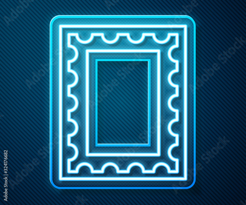 Glowing neon line Postal stamp icon isolated on blue background. Vector Illustration