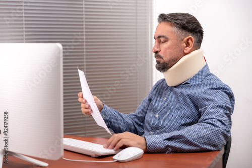 Middle aged man with a neck brace.