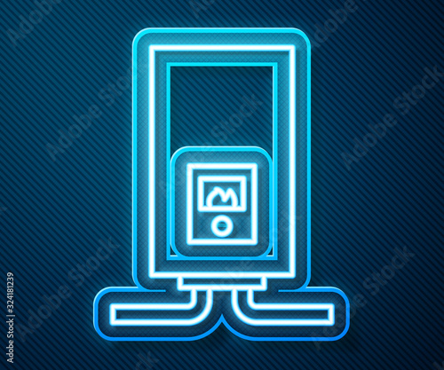 Glowing neon line Gas boiler with a burning fire icon isolated on blue background. Vector Illustration