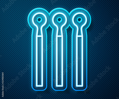 Glowing neon line Matches icon isolated on blue background. Vector Illustration