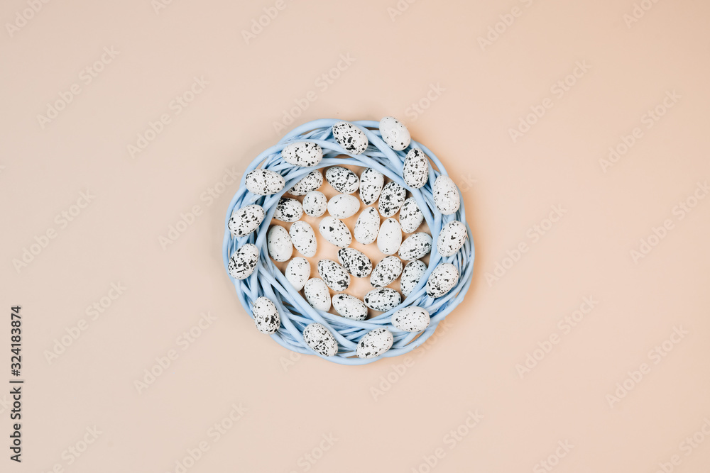 Composition of Easter eggs. Easter holiday concept. Blue wreath Composition of Easter eggs. Easter holiday concept. Blue wreath