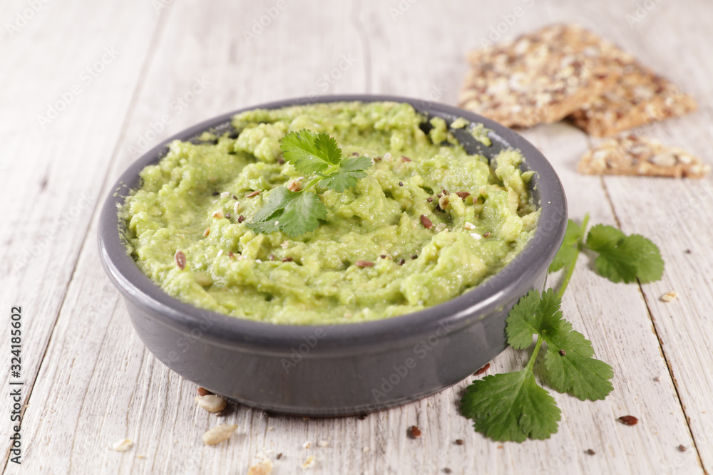 appetizer, guacamole with cracker bread appetizer, guacamole with cracker bread