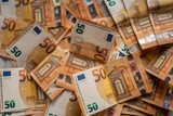randomly placed  50 euro paper bank notes european cash currency 