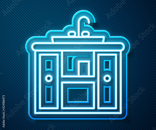 Glowing neon line Washbasin cabinet with water tap icon isolated on blue background. Vector Illustration