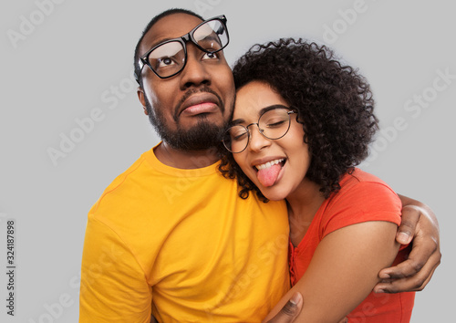Canvas Print relationships, vision and people concept - happy african american couple in glas
