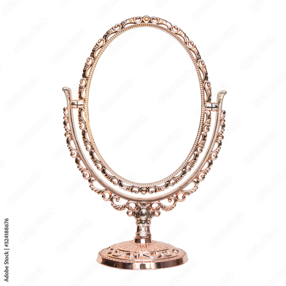 Table mirror in a gilded frame with lace on a white background Table mirror in a gilded frame with lace on a white background