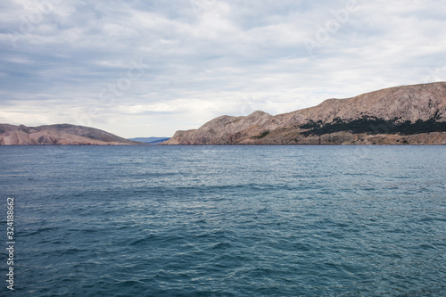 Wallpaper Mural View of the sea and  mountains  cloudy weather. Greatness and tranquility of the landscape Torontodigital.ca