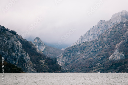 Landscape of a mountain lake with a fjord and a cloudy day © Dani