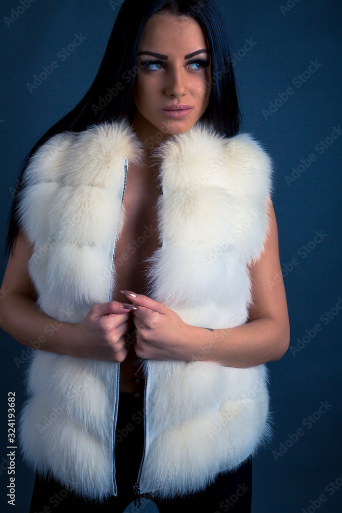 Beautiful brunette girl wearing fur coat Beautiful brunette girl wearing fur coat