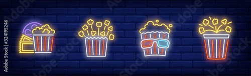 Pop corn neon sign set. Bucket, 3d glasses, reel, explosion. Vector illustration in neon style, bright banner for topics like cinema, movie watching, entertainment