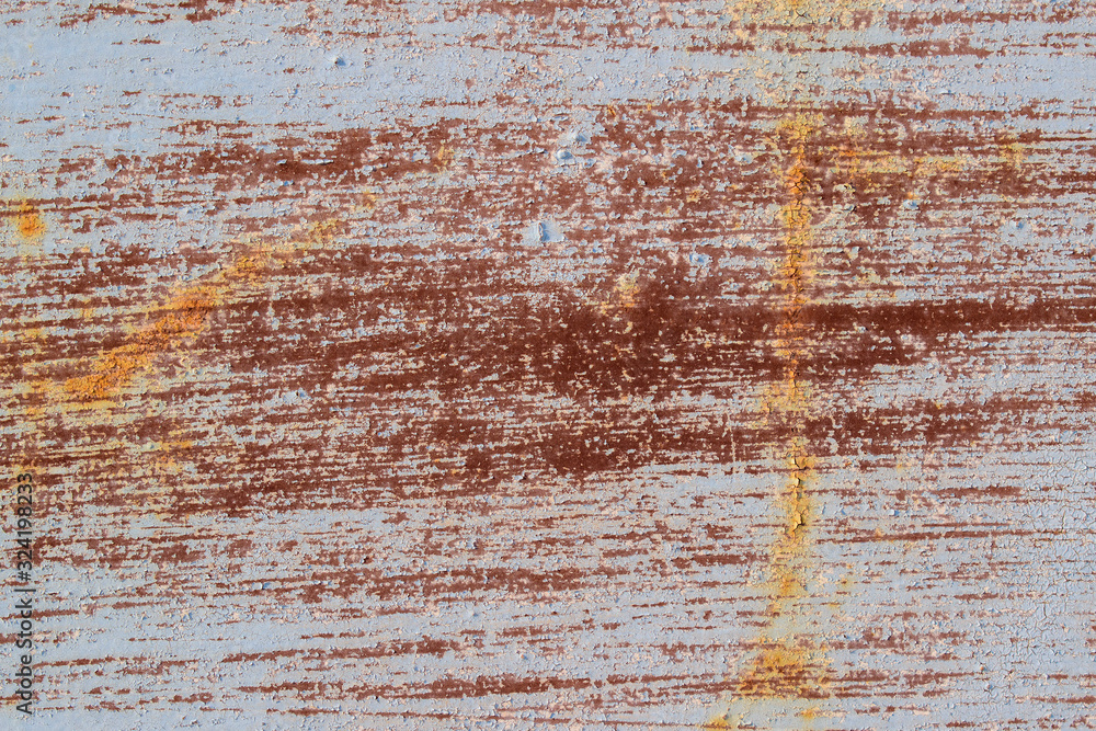 Obraz premium Old paint on a rusty wall. Main color Ghost, shade of Blue. Horizontal stripes, scuffing, peeling.