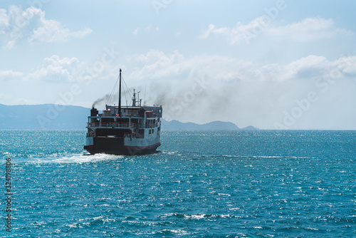 A ship/ferry at sea in the gulf of Thailand