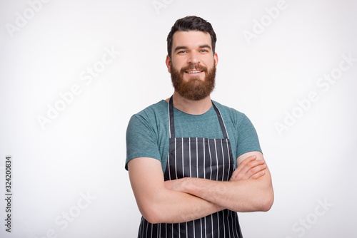 Cooking courses figure. Portrait of a confident bearded cooker o