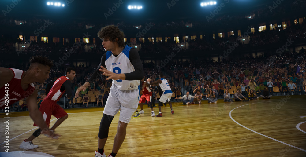 Basketball players on big professional arena during the game. Tense moment of the game. 