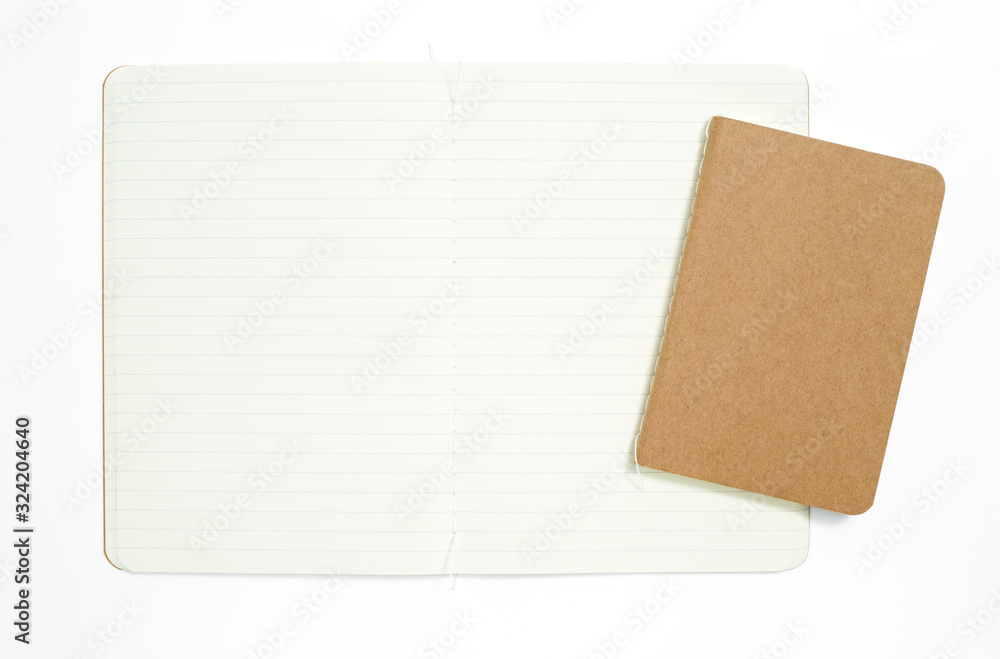 Fototapeta premium Top view of open stitch blank recycled paper cover notebook on white background.