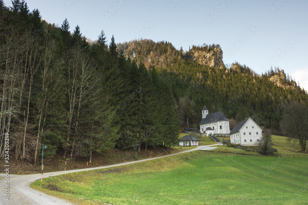 Beautiful small church and cemetery for mountaineer and climbers in Johnsbach village, in The Gesause National Park, Styria region, Austria