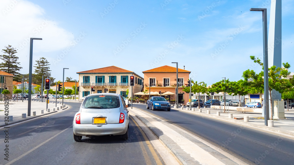 Republic of Cyprus. Paphos Street. Mediterranean city. Road in Cyprus. Panorama of Paphos on a summer day. Vacation on the shores of the Mediterranean sea. Visiting Cyprus.