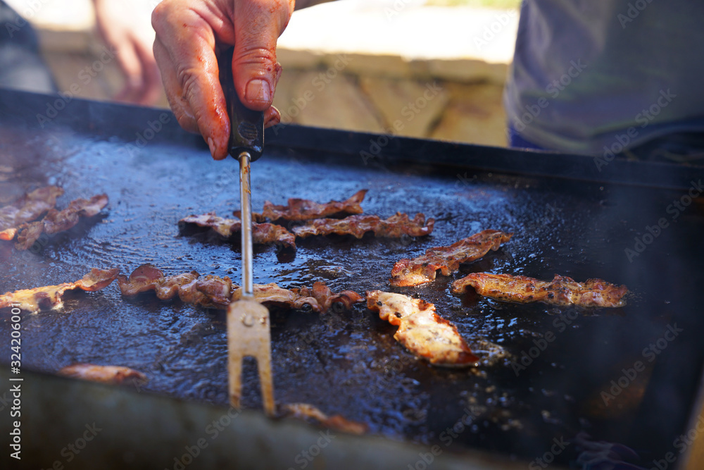 BBQ and grill in Novalja. Right on Zrce Beach. Delicious bacon crispy fried. BBQ and grill in Novalja. Right on Zrce Beach. Delicious bacon crispy fried.