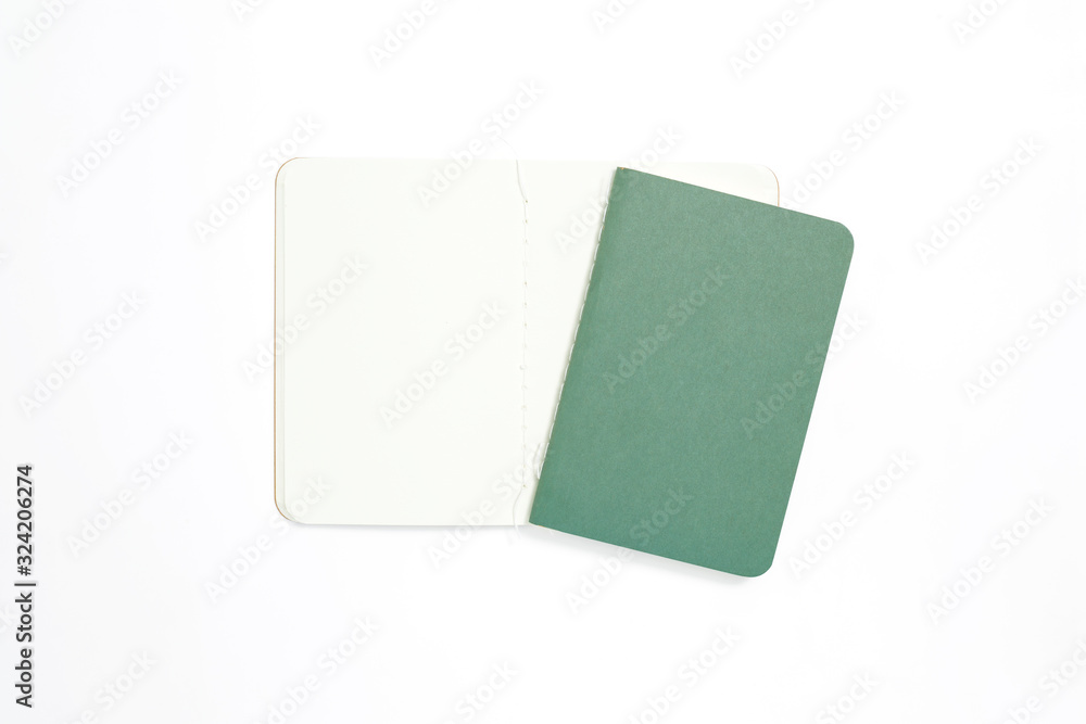 Top view of open stitch blank recycled paper cover notebook on white background. Top view of open stitch blank recycled paper cover notebook on white background.