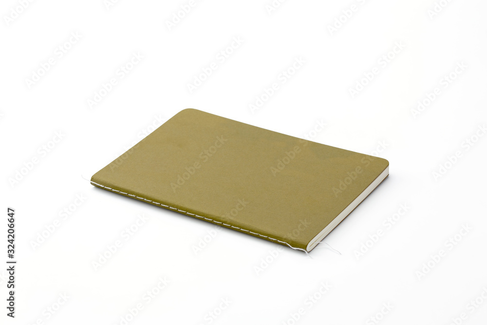 Top view of closed stitch blank recycled paper cover notebook on white background. Top view of closed stitch blank recycled paper cover notebook on white background.
