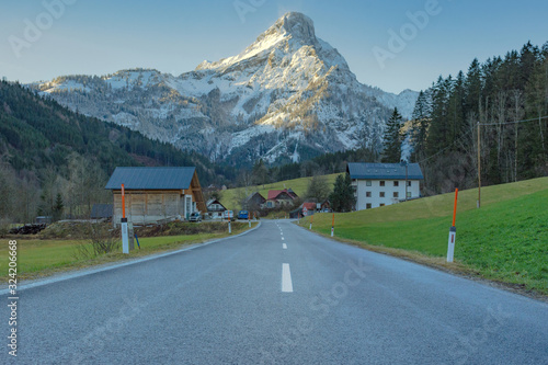 Road with beautiful mountain view in Johnsbach village in The Gesause National Park, in Styria region, Austria
