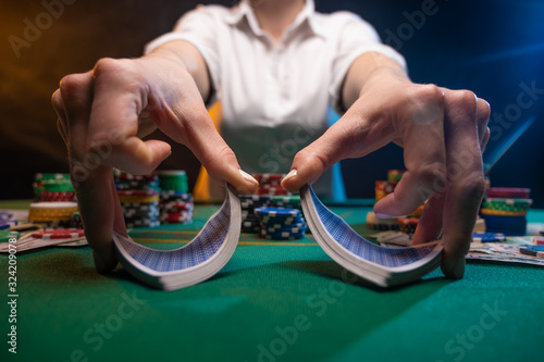 Gambling business in a casino. Industry in night clubs, croupiers or dealers, distribution of cards. A lot of money, chips. Online poker business.