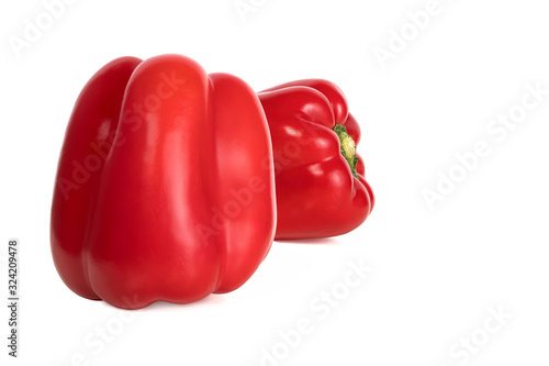 two fresh sweet peppers isolated on white background © westermak15