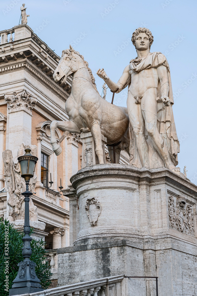 Fototapeta premium marble statue of Dioscur, patron saint of republican Rome in the center of the Italian capital