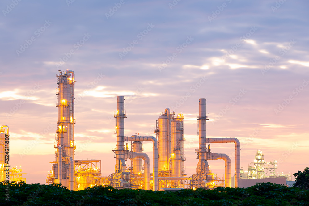 Obraz premium Oil gas refinery plant. May called petroleum, production or petrochemical plant. Industrial factory construction from engineering technology with steel pipe, pipeline, tank. Business for power energy.