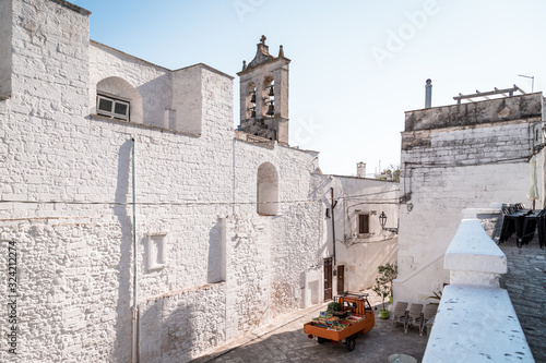 Historic center of white city of Ostuni in Puglia  in a day of August