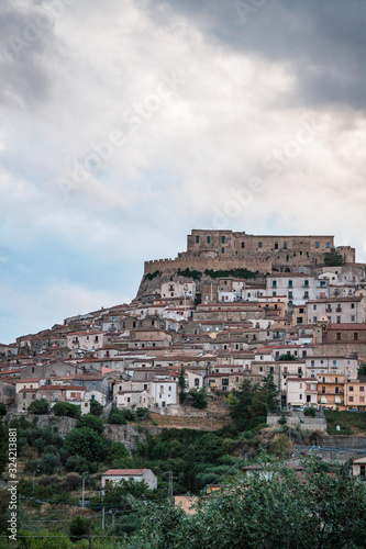 View of ancient village of Rocca Imperiale, in Calabria, during a sunset of August