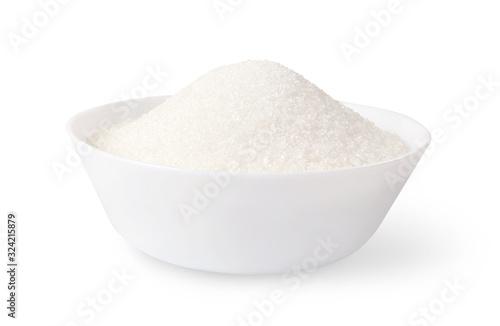 White sugar in a bowl isolated on white backgroud.