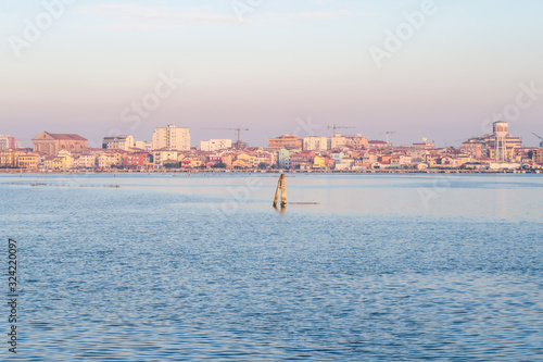 view of chiggia and sottomarina in venice at sunset photo