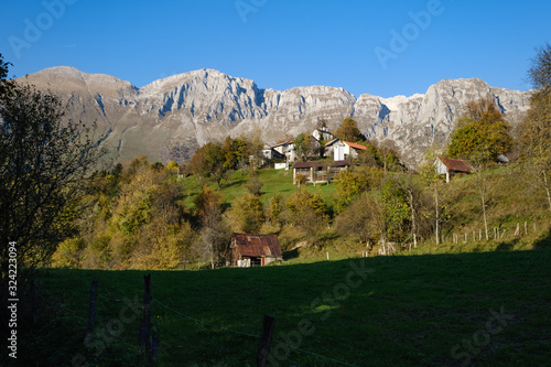Krn village under mountains in autumn
