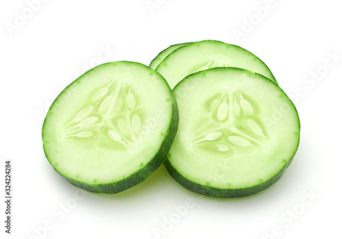 Sliced cucumber isolated on a white background. photo