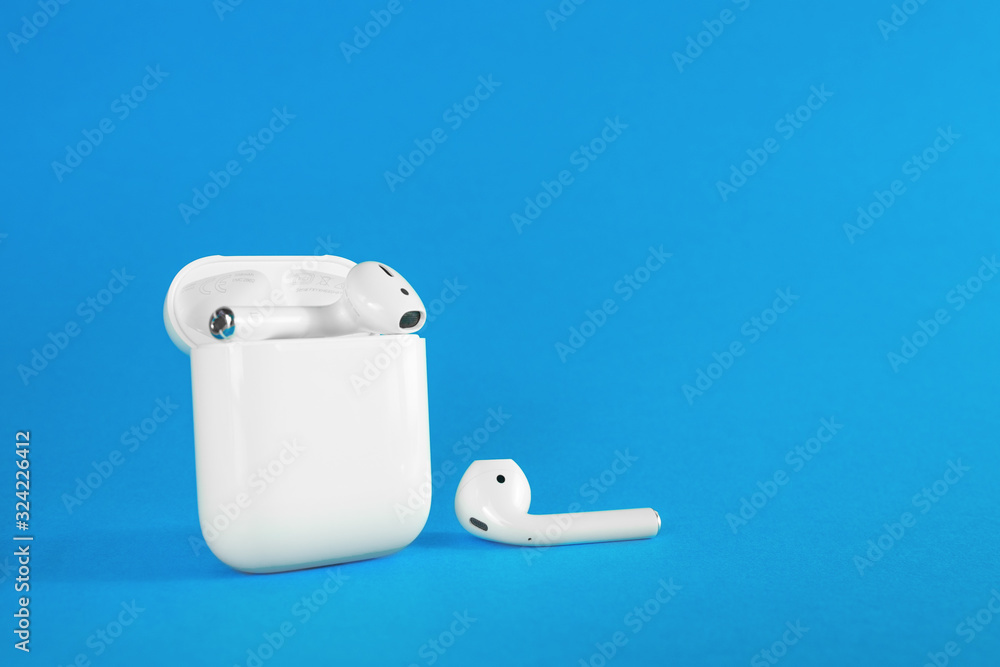 ROSTOV-ON-DON, RUSSIA - February 24, 2019: Apple AirPods wireless Bluetooth  headphones and charging case for Apple iPhone. New Apple Earpods Airpods in  box. Stock Photo | Adobe Stock