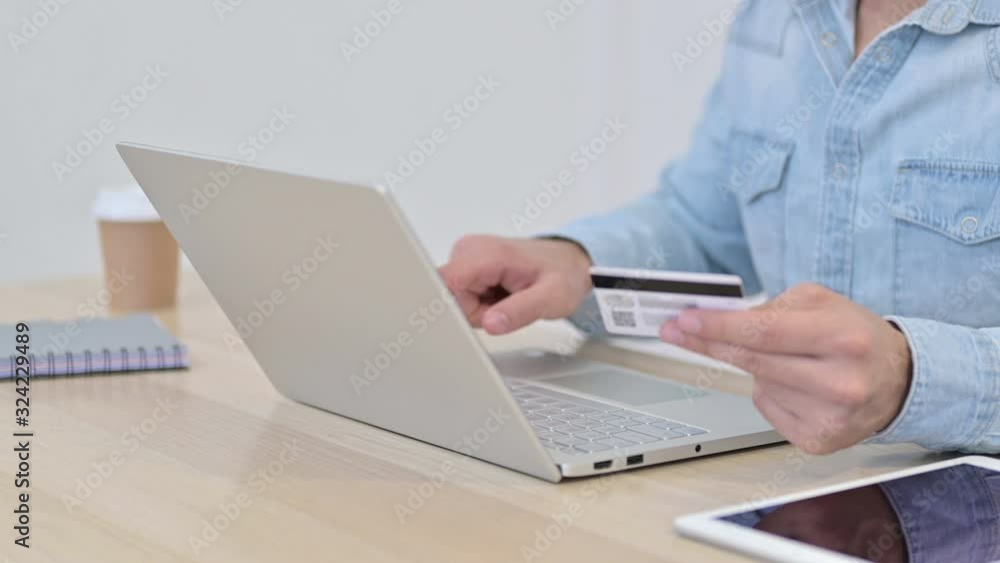 Man Celebrating Online Payment on Laptop, Close up Man Celebrating Online Payment on Laptop, Close up