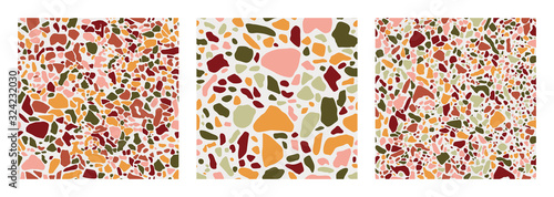 Collection of Terrazzo floor covering seamless pattern in green, terracotta, pink and yellow colors. Vector background