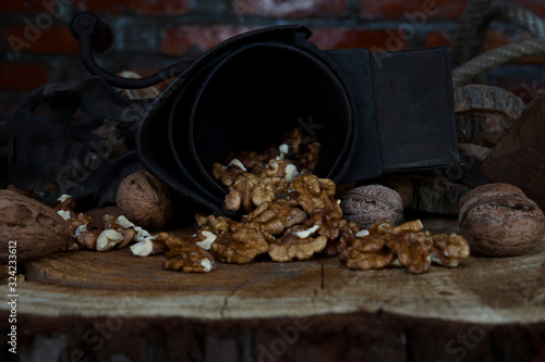 Walnuts on Rustic Old Table with Vintage Hand Grinder
