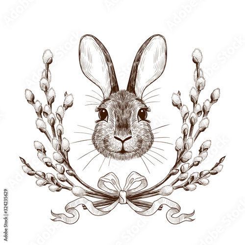.Easter Bunny in a wreath of willow branches.Engraved design elements.Festive vintage image.Hand drawn vector illustration..