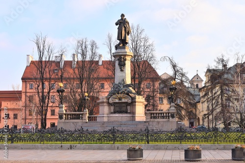 Warsaw, Poland - January 2020. Monument of Adam Mickiewicz in Warsaw, Poland. Neoclassical monument of poet Adam Mickiewicz located in Krakowskie Przedmiescie. Tourist attraction