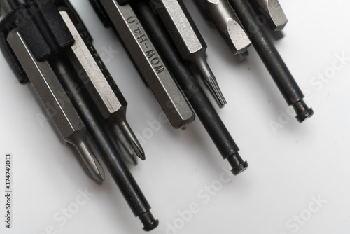 macro view of set of silver screwdriver bits collection