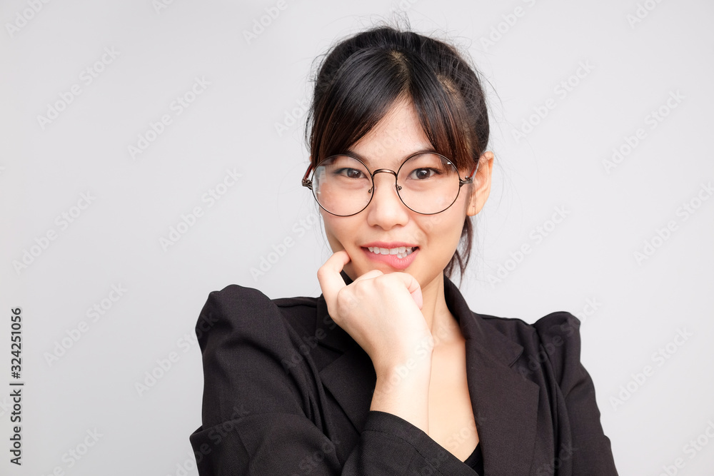 Beautiful attractive business asian women wear eyeglasses smiling on white background Beautiful attractive business asian women wear eyeglasses smiling on white background