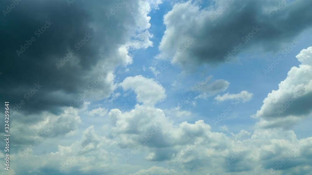 4K Timelapse moving clouds white in to gray clouds in blue sky before rain fall. 4K Timelapse moving clouds white in to gray clouds in blue sky before rain fall.