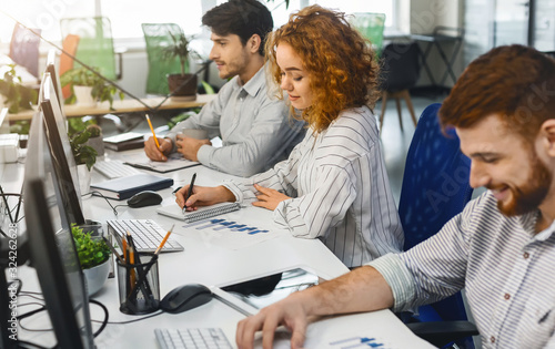 Young professional team working on marketing strategy in office