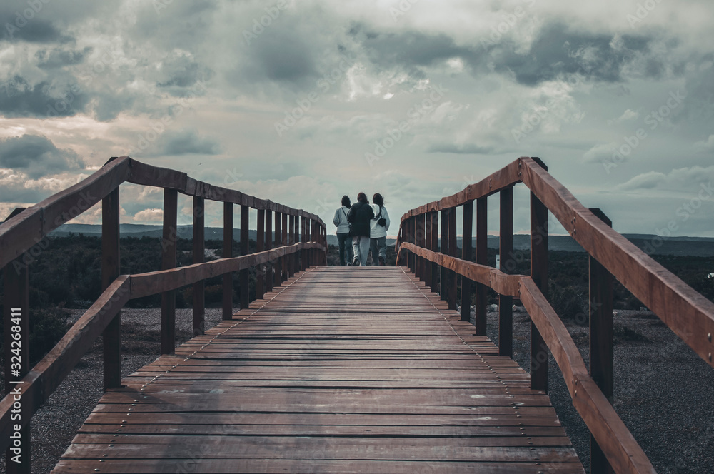 People walking at the end of the road