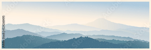 Mountain morning landscape panoramic type with the silhouettes of the mountains against the dawn